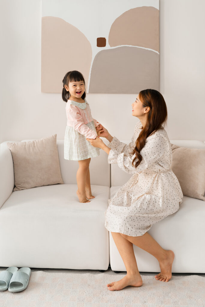Mother and Daughter on a couch
